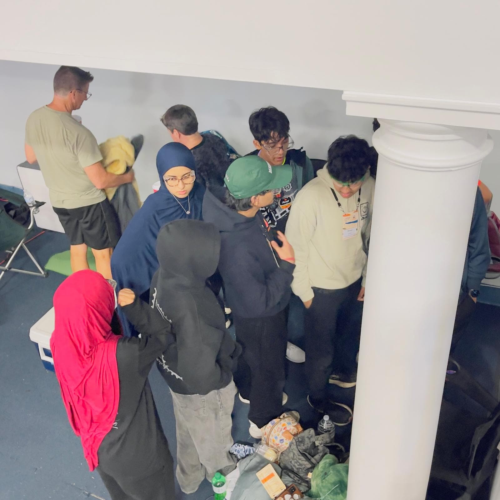 ITKAN Janktastrophe students huddle together during the overnight matches at the Carolinas Premier Event