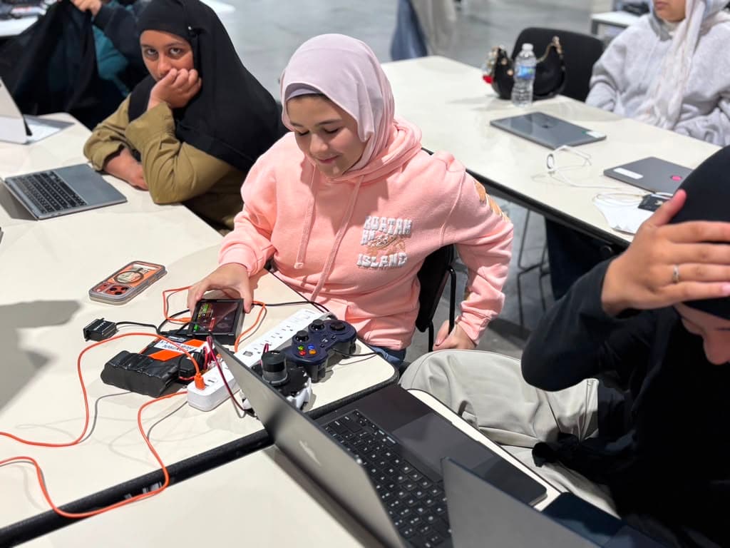 ITKAN students wire up and test a control system during Summer Training