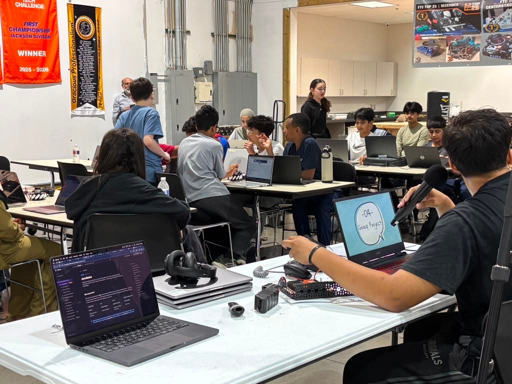 ITKAN students collaborate on a group project during Summer Training